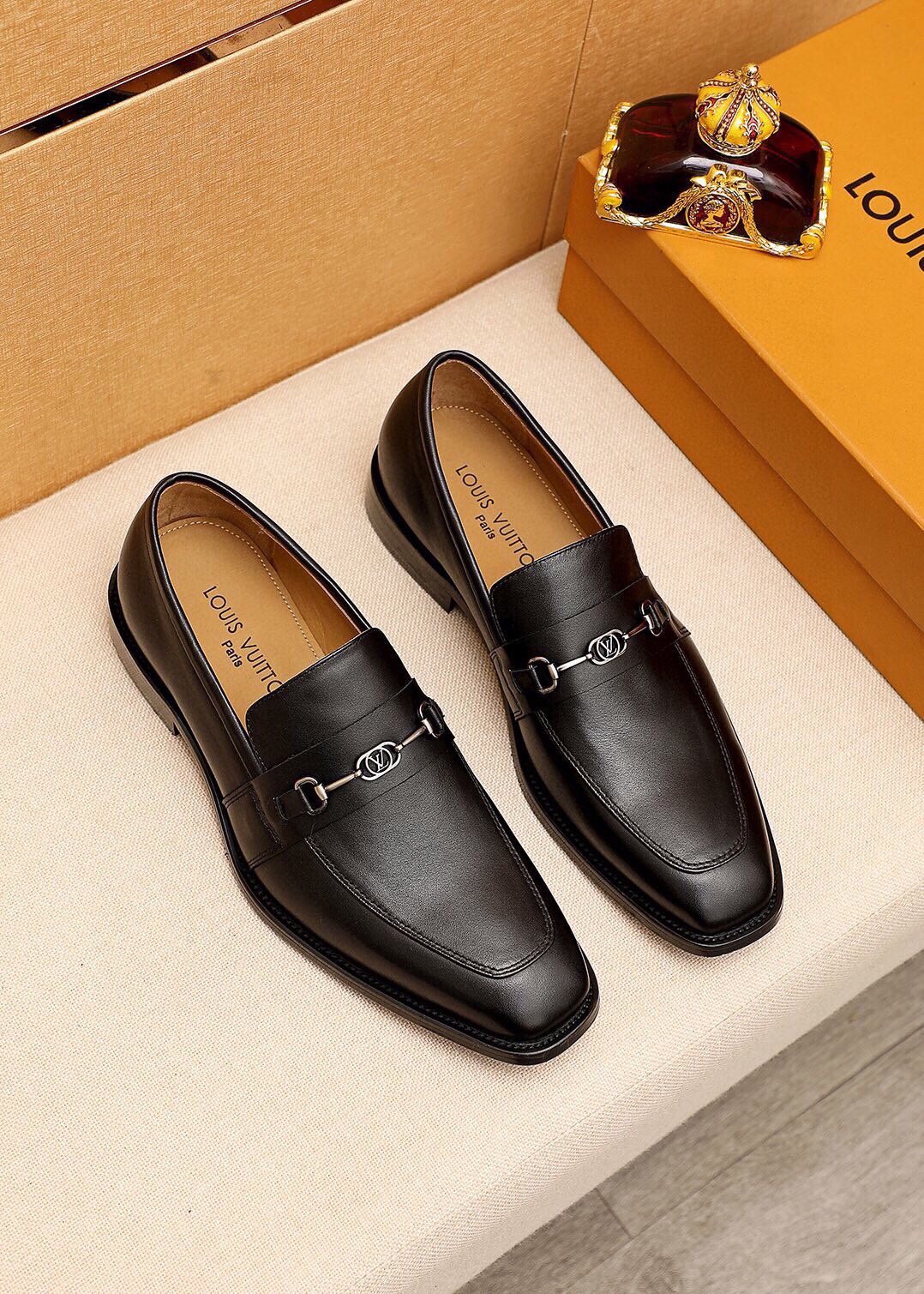 Louis Vuitton Black Metal-Bit Leather Loafers — front