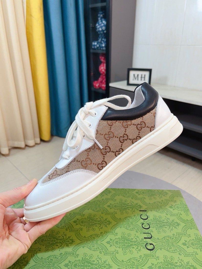 Gucci Embossed Low-Top Sneakers — detail
